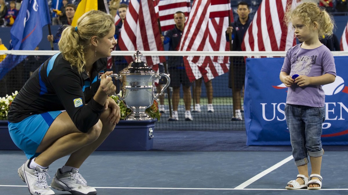 Kim Clijsters  celebrates with her daughter Jada Lynch after winning the 2010 U.S. Open.